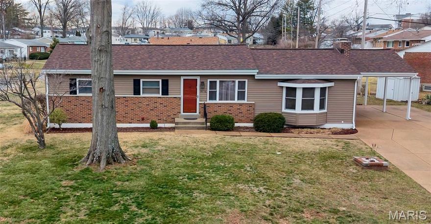 Welcome to the Maple Hills subdivision! This beautifully updated three-bedroom, two-bathroom home is move-in ready for its new owners. In 2026, it received significant upgrades, including a new roof, siding, fascia, gutters, and a carport -- all with a transferable warranty.  You'll love the expansive, well-maintained driveway leading to the updated carport, as well as the inviting outdoor patio.  The spacious family room is truly special, featuring a cozy wood-burning fireplace and abundant natural light.  Through the main level, the home is bright and airy.  Downstairs, you will find the fully updated lower level offers incredible flexibility--perfect for a home office, a guest suite or a recreational room.  It's complete with a half bath and a dedicated laundry/workspace, offering additional convenience and comfort space for everyday living.

Come see this home and experience all it has to offer--its truly ready for you!