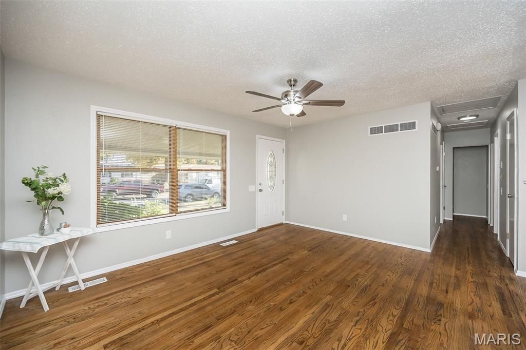 Photo of 1060 Kingsbrook Lane, Florissant, MO 63031 (MLS # 25072568)