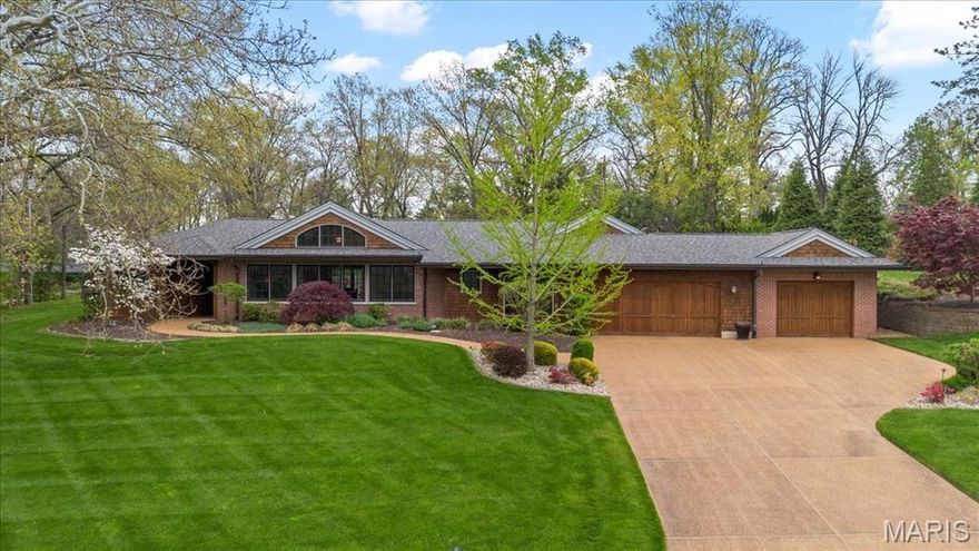 Purposeful design and classic finishes allow this Ladue ranch to live effortlessly.  Updated and maintained with a keen sense on details, this 5-bed/4.5 bath has over 5300’ of living space.  The center of the home was designed for living and entertaining replete with Viking commercial appliances, dual work zones and plenty of countertop, storage and pantry space.  The living and dining rooms are open, yet allow for easy furniture placement and access to patio and gardens, expanding your entertaining space.  The large primary suite is situated in a separate wing while 4 additional bedrooms (2 ensuite) are in another wing.  A perfect setup for children, au pair or in-law suite.  A flex space for home office, study or crafting, main floor laundry and attached 3-car garage round out first floor.  The LL has over 1600’ of finished space including theatre room, additional living room with half bath and plenty of storage.   Too many updates to mention.  Start living your best life today!