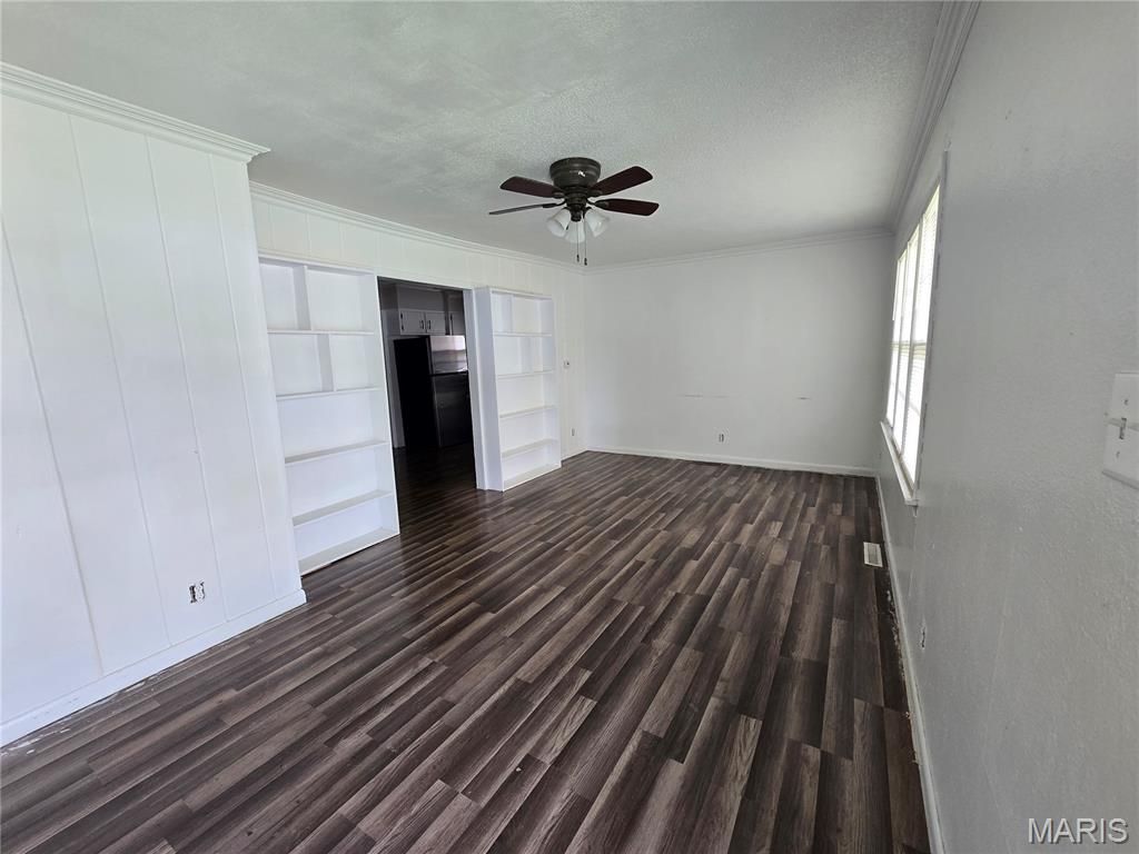 Photo of 801 N Poplar Street, Dexter, MO 63841 (MLS # 26025182)