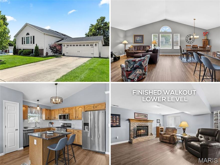 Elegant split foyer with soaring ceilings, reworked OPEN CONCEPT floor plan and FINISHED WALKOUT lower level, in quiet cul de sac near the scenic Dardenne Greenway Trail. NEWER ROOF, gutters, front door with sidelite, full-glass storm door and carriage lights. Foyer upgraded with iron-spindled stair up to EXPANSIVE VAULTED GREAT ROOM with Palladian window. Newer water-resistant WIDE PLANK luxury vinyl flooring. Bright dining/kitchen with generous wood raised-panel cabinets, SILESTONE counters, tile backsplash, newer faucet, STAINLESS appliances (refrigerator stays), chef's gas range and storage pantry. Primary suite features crown molding, relaxing bath with newer SKYLIGHT, oversized vanity and glass-enclosed shower. Secondary bedrooms have NEWER CARPET and share hall bath with tub/shower combo, another skylight. Downstairs flexible rec room with brick FIREPLACE, newer full-glass atrium doors to COVERED PATIO with wood-finished ceiling - ideal for entertaining. Convenient half bath, laundry (washer and dryer stay), storage and newer sump pump. QUARTER ACRE LOT with premium METAL-FENCED backyard. 2-car garage with newer opener. Ranked in Money magazine's "Best Places to Live", St Peters includes 1200 acres of parkland, 2 outdoor pools, huge variety of shops and restaurants, plus AWARD-WINNING SCHOOLS. Easy access to Highways 70/79/K/370/364/94. Most daily errands within a mile.