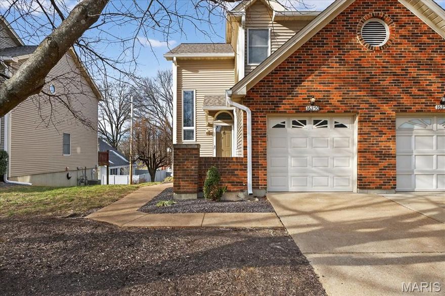 Beautifully maintained townhome in the heart of Chesterfield, offering convenient access to highways, grocery stores, restaurants, shopping, and everyday amenities. Residents also enjoy access to a subdivision pool for added leisure and recreation. Step inside to find wood flooring throughout the main level and a spacious family room featuring a cozy fireplace. The kitchen is equipped with granite countertops, a breakfast bar, stainless steel appliances, and an adjoining dining area with a sliding glass door that opens to the back deck, perfect for everyday living and entertaining. Upstairs, the vaulted primary suite includes dual closets and a private ensuite bath with double sinks, a walk-in shower, and a separate soaking tub. An additional bedroom and full bath complete the upper level. The walk-out lower level offers a large rec room or potential sleeping area, along with a full bath for added flexibility. Additional highlights include a main-level laundry room, 1-car attached garage, covered patio, and deck, providing multiple spaces to relax and enjoy the outdoors.