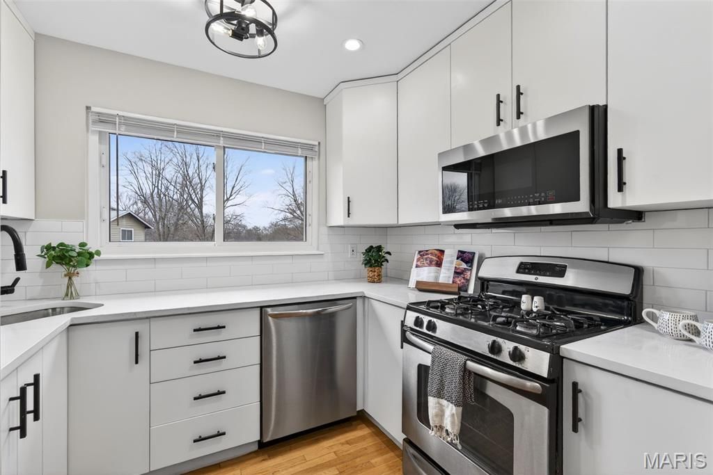 Photo of 4 Sunnydays Court, St Charles, MO 63303 (MLS # 25080308)