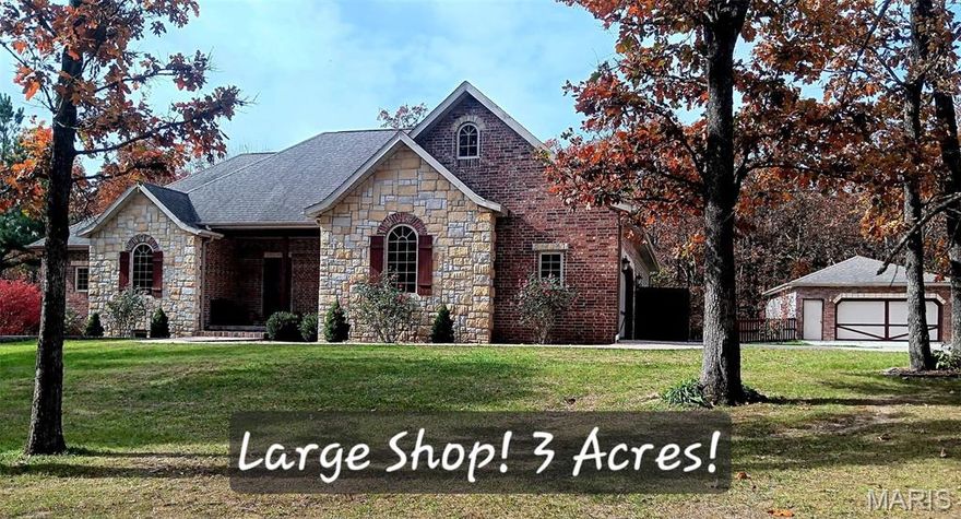 WELCOME to PARADISE nestled in the woods in a PARKLIKE SETTING only 2 MILES FROM TOWN and I-44! Making it an EASY COMMUTE TO FT. WOOD OR SPRINGFIELD. This CUSTOM BUILT, ONE OWNER 4900 SF ML HOME on 3 acres PLUS a LARGE, HEATED 24X36 SHOP with ATTACHED 9X24 TRACTOR SHED! This beautiful home has a VERY OPEN MAIN LEVEL WITH 2 MASTER SUITES (OR 1 MASTER/1GUEST) each with walk-in showers, large closets, and one has a JACUZZI TUB! The Great Room has a MASSIVE CATHEDRAL CEILING and AWESOME STONE SEE-THROUGH PROPANE FIREPLACE! The DINING ROOM/HEARTH ROOM shows the other side of the fireplace and opens up into the LARGE KITCHEN WITH BEAUTIFUL CUSTOM CABINETS with WHIRLPOOL STAINLESS STEEL APPLIANCES including DOUBLE OVEN AND JENN AIR GRILL! Also a HOME OFFICE, LAUNDRY ROOM, PANTRY, SPARE BATH, AND GREAT OPEN VIEWS! Upstairs there’s a LARGE BONUS ROOM that could be an extra bedroom, family room, or office!  The OPEN STAIRCASE LEADS DOWNSTAIRS TO THE LARGE SPORTS ROOM WHERE THE POOL TABLE and air hockey table are located!  Also a separate MEDIA ROOM FOR THE BIG SCREEN TV AND SURROUND SOUND and a room for your exercise equipment! Down the hall you will find 4 LARGE BEDROOMS WITH WALK IN CLOSETS THAT HAVE QUEEN BEDS and one has A KING BED!  Also 1 FULL BATH, 1 HALF BATH, HVAC ROOM, AND TORNADO SAFE ROOM! This is a WALKOUT BASEMENT and ALL BEDROOMS HAVE WINDOWS! The LANDSCAPING IS BEAUTIFUL! GREAT LOCATION NEAR THE HOSPITAL AND SCHOOLS! 6 ADDITIONAL ACRES AVAILABLE for added price! DON’T MISS YOUR CHANCE TO OWN THIS ONE OF A KIND PIECE OF TRANQUILITY!