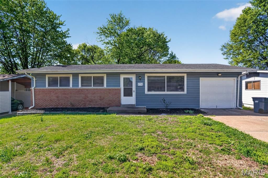 Photo of 1752 Hudson Road, St Louis, MO 63136 (MLS # 26023115)