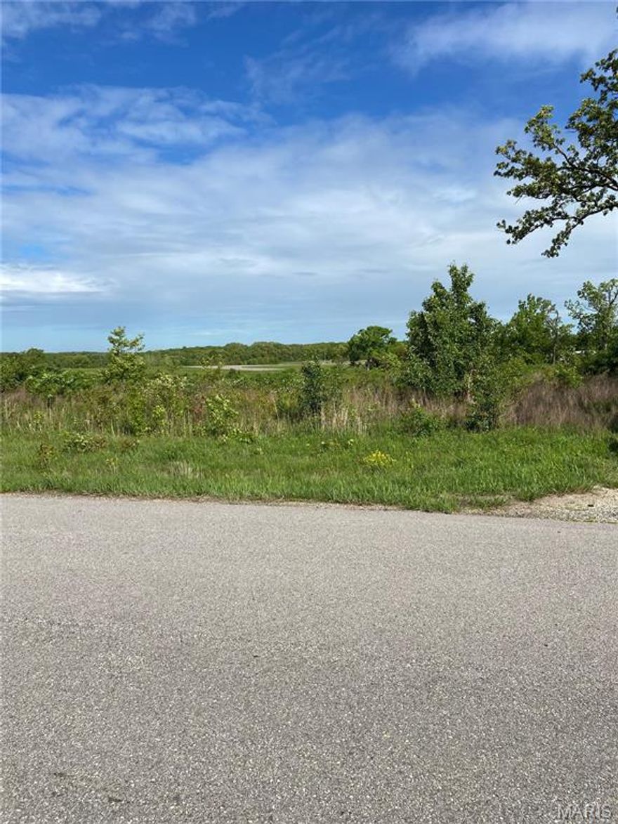 Seize a fantastic opportunity! 3.1-acre commercial lot just outside Cuba, MO. Prime location with 451 feet of I-44 North Outer Road frontage, gently sloping terrain, and roadways on the North and South sides for potential drive-through access. This property offers high visibility and accessibility. 
Includes a poured concrete 150’ X 30’ terraced foundation, gravel parking lot approximately 16,000 sq ft, electric service available, and a drilled well (no pump). 
Provides a versatile high-potential solution for commercial endeavors such as professional services, retail, office space, storage/boat/camper, or mixed-use. Its proximity to Cuba Municipal Airport offers additional possibilities for ground-to-air services. This site is strategically positioned to attract local and traveling customers. Don't miss this rare opportunity for commercial property with great visibility and accessibility to I-44.