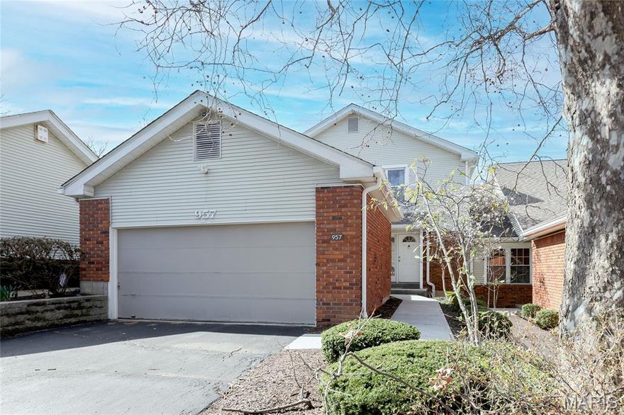 Open Sat 4/4, 10am-12pm. Rarely does a home in Briarcliff come to market fully updated and move-in ready. 957 N Spoede Road is exactly that, a 4-bedroom, 3-bath home in the Ladue School District that has been renovated from top to bottom with no detail overlooked.

The showstopper kitchen has been fully renovated with custom cabinetry, quartz countertops, stainless steel appliances, a built-in wine refrigerator, and a large center island. Whether you are hosting a dinner party or enjoying a quiet morning, this kitchen delivers the space and style to match.

The great room centers around a striking stacked stone accent wall with built-in media and recessed lighting, creating a warm and inviting space to relax and entertain.

The two-story dining room impresses with soaring ceilings, a dramatic accent wall, and direct access to the private deck overlooking serene lake views. Whether morning coffee or evening entertaining, the outdoor spaces are a true highlight of this home.

Upstairs, the home offers three generously sized bedrooms along with a beautifully updated full bath.

The finished lower level adds tremendous flexibility with a large family room with a custom accent wall and built-in media, walk-out access to a covered screened porch with sweeping lake views, a full bath, and an additional bedroom ideal for guests, in-laws, or a home office.

Additional highlights include a 2-car garage, deck and screened porch with gorgeous water views, and association management for low-maintenance living. All of this just minutes from Olive Boulevard shopping and dining, with easy access.