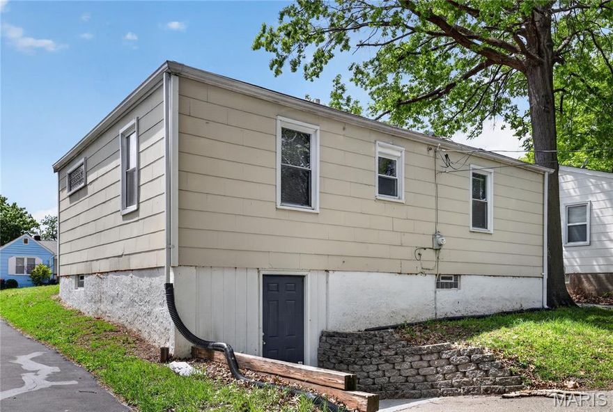 Welcome to 7525 Chandler Ave, a cozy and inviting home located in a quiet neighborhood in St. Louis County. This property features a functional layout with comfortable living areas and plenty of natural light, offering a warm and welcoming atmosphere. The spacious yard provides great potential for outdoor entertaining, gardening, or future improvements. Conveniently situated near major highways, shopping, dining, and local amenities, this home ensures easy access to everything you need. Located within the Jennings School District, it presents a great opportunity for first-time buyers or investors looking for value and potential. Don’t miss out on this promising property!