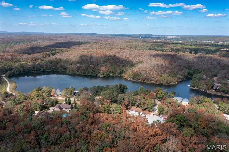 Beautiful waterfront lot in Deer Run Estates offering the perfect setting for your future lake home. Purchase individually or with the adjoining lot for added space and privacy. Public water, sewer, natural gas, electric, and Spectrum internet available. Enjoy lake amenities including boating, fishing, and the community swimming area. Located off Hwy OO between Fredericktown and Farmington.