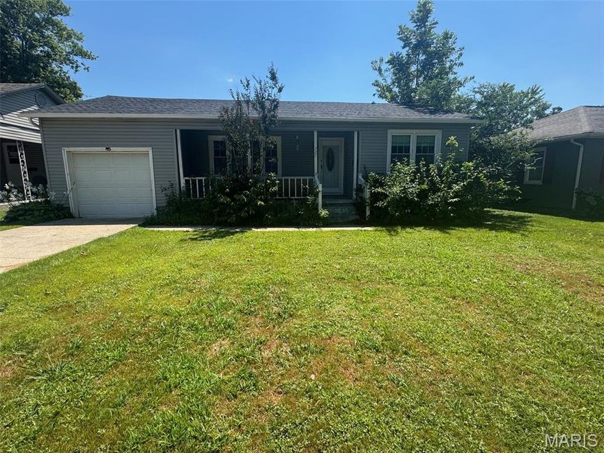 Cute 2 bedroom and 1 bath home located 3 blocks from schools. Original hardwood floors in living room and bedroom rooms. Recently up dated. 1 car garage, shop/shed also has overhead door. Great starter home or one to downsize in.