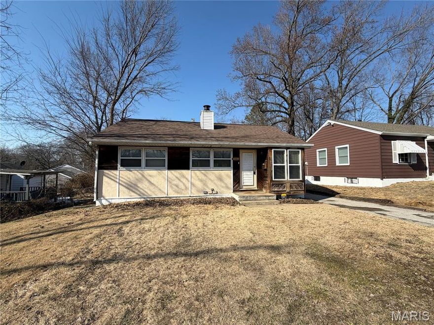 Welcome to this ranch home with just over 1,400 finished sqft with detached garage situated in the area of Riverview Gardens. This property offers an updated architectural shingle roof, vinyl windows, electrical panel, & HVAC system. Front living room features a brick fireplace flanked by built-in shelves. New carpet carries through the living room, hallway and finished lower level. Kitchen offers a great layout with plenty of counter space and cabinet storage. Dining room is open to the living space offering a great layout for entertaining. Main level includes two generously bedrooms, the second with a loft area and a nicely updated hall bath w/ skylight. Head down to the finished lower level to find a large family room, & sleeping room which could easily be converted to a 3rd bedroom with the addition of an egress window. This property a must add to your portfolio! Schedule your private showing today! Agent owned. Property will come with a passed occupancy inspection.