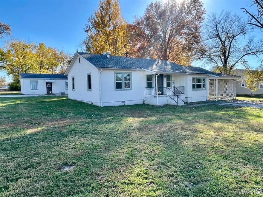 Charming 3-bedroom, 1-bath home sits on a beautiful corner lot in a quiet Mountain Grove neighborhood. This home built in the has character. Roof replaced approximately six years ago. The property includes a detached guest-suite Approximately 240 sq, rented as a studio apartment, offering excellent income potential. Situated on 0.32-acre lot within city limits, this property is just a short walk from the park, soccer fields, and fairgrounds. Great opportunity for homeowners or investors alike!