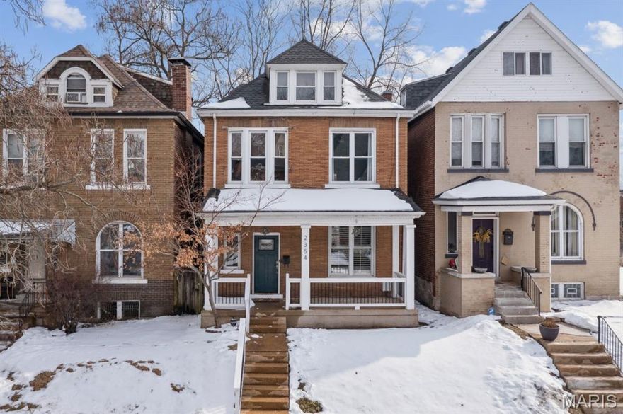 Fantastic location in Tower Grove East, this lovely 2.5 story home will captivate you with its blend of historic details and updated features. Cherish original wood floors, waterfall staircase, and decorative fireplace while enjoying fresh finishes and the natural light that pours throughout the home. The spacious kitchen has center island and is open to dining area making it easy for guests and cooks to mingle. Half bath on the main floor and coat closet for convenience. 2nd floor has more hardwood floors, 3 spacious bedrooms, & 2 bathrooms, including a large primary with two closets & an ensuite with separate tub & shower + stacked washer/dryer. 3rd floor is dedicated bedroom suite with full bath and walk-in closet. Window placement brings in an abundance of natural light to this spa-like space - your personal oasis. Off-street parking with a coveted 2 car garage-port, plus a deck and fenced yard. Welcoming front porch with great curb appeal, and just a short walk to Tower Grove Park!