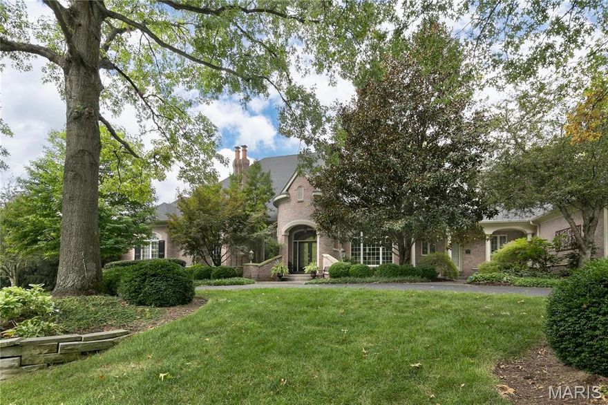 Exceptional quality is found in the construction of this former Deshetler model home. Arched room entrances, arched windows, multiple piece crown moldings & other detailed millwork & soaring ceiling heights.  Upon entry, find a handsome paneled Office/Den w fireplace & gracious Din Rm w double tray ceiling.  Main floor Primary Bedrm w fireplace & luxury bath. In addition, there are 2 other main floor BR.  Every BR has private bath. Wonderful Hearth Rm right off of Kitchen/Breakfast area. Wet Bar leads out to patio/pool. Great Rm. Main Floor Laundry. Second floor has Bedroom Ste with its own living room for a perfect Guest/Live-In space accessed by private stair near carpool entry.  Enormous Finished Walkout LL w another BR, Full Bath, Fam Rm, Rec area with billiard table, Wet Bar, Office/Music rm and Exercise rm. Plenty of basement storage.  Incredible closet space throughout!  Oversize 4 car gar, private pool w waterfall & outdoor grill/kitchen. Dream home in great location.