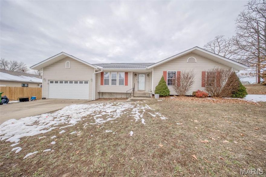 Agent-owned property.  Welcome home to this move-in ready 3 bedroom, 2 bathroom residence offering over 1,800 square feet of comfortable living space in Rolla - close to all of your favorite amenities! Step inside to an open floor plan where a spacious living room with vaulted ceilings flows seamlessly into the dining area, complete with access to the sun room—perfect for relaxing or entertaining year-round. The kitchen is both stylish and functional, featuring a tile backsplash, stainless steel appliances, and a generous pantry. A cozy family room adds even more living space and showcases a beautiful wood-burning fireplace. The primary suite provides a private retreat with a walk-in closet and an ensuite bathroom. Outside, you’ll love the impressive privacy-fenced backyard, complete with a kennel, offering plenty of room for pets, play, or outdoor enjoyment. This well-maintained home is ready for its next owner—schedule your showing today!