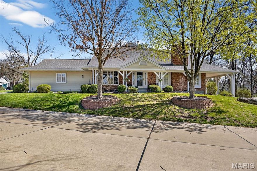 Welcome to elevated living in the prestigious Broadmoor Neighborhood. This stunning 4-bedroom, 3-bathroom maintenance-free villa offers the perfect blend of sophisticated design and effortless lifestyle — all within one of the area's most sought-after communities.
From the moment you step inside, the dramatic vaulted two-story entry foyer sets the tone, offering sweeping views across the entire main floor. An open floor plan and rich hardwood flooring throughout the main living areas create a warm, inviting atmosphere ideal for both everyday living and upscale entertaining.
The main level impresses at every turn — a vaulted family room with an open wood staircase and cozy gas fireplace, a separate formal dining room featuring custom wood flooring and a coffered ceiling, and a kitchen that is nothing short of extraordinary. Designed for the serious chef, the kitchen boasts custom cabinetry with sliding drawers, quartz countertops, Wolf stainless steel appliances, Cove dishwasher, and a built-in KitchenAid refrigerator. A thoughtfully removed wall now connects the kitchen seamlessly to the dining area, while an expansive quartz breakfast bar provides generous space for gathering. Sliding glass doors open to a private courtyard — your own peaceful outdoor retreat.
The main floor primary suite is a true sanctuary, complete with hardwood floors, and a ceiling fan. The spa-inspired primary bath was fully expanded and remodeled, showcasing tile floors, a custom tall vanity with Quartz countertop, and a luxurious Onyx walk-in shower. A conveniently tucked-away stackable LG washer and dryer adds exceptional main level laundry convenience right where you need it most along with custom built-in cabinetry.
Upstairs, two additional bedrooms and a completely updated full bath offer comfort and style for family or guests.
The walk-out lower level extends your living space beautifully — featuring a second gas fireplace, an expansive family/recreation room with wall-to-wall built-in bookshelves, and a wet bar perfect for entertaining. A fourth bedroom with walk-in closet and an updated full bath complete the lower level, which opens directly to a covered private patio surrounded by lush trees and natural privacy.
Additional highlights include a 2-car garage and abundant storage throughout.
As a resident, you'll enjoy access to an exceptional clubhouse, resort-style pool, pickleball courts, and tennis courts — all in a truly fantastic location. This is a rare opportunity you simply must see in person.