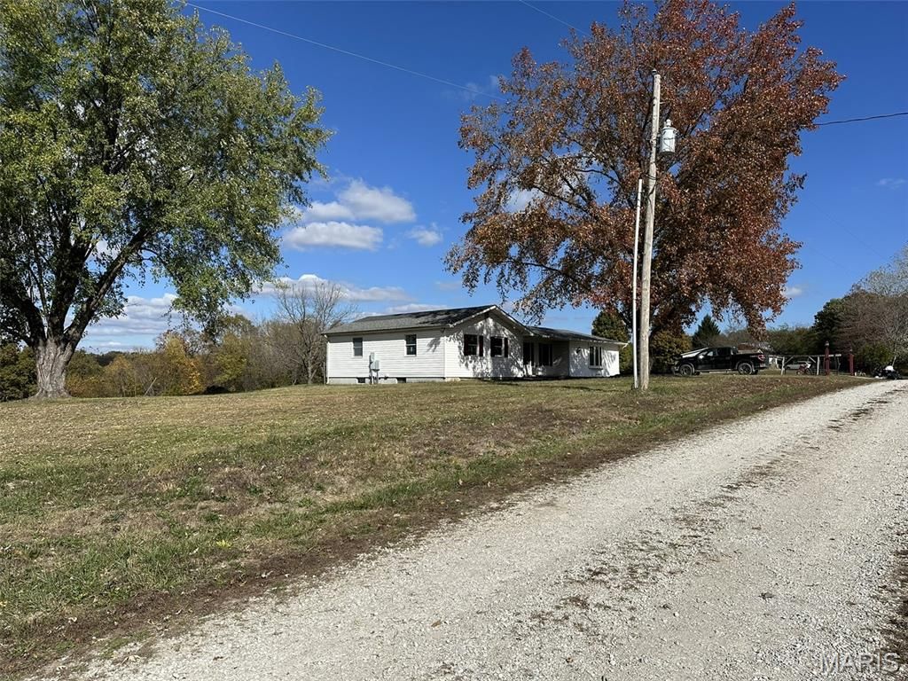 Photo of 303 Bird Song Lane, St Clair, MO 63077 (MLS # 25073565)