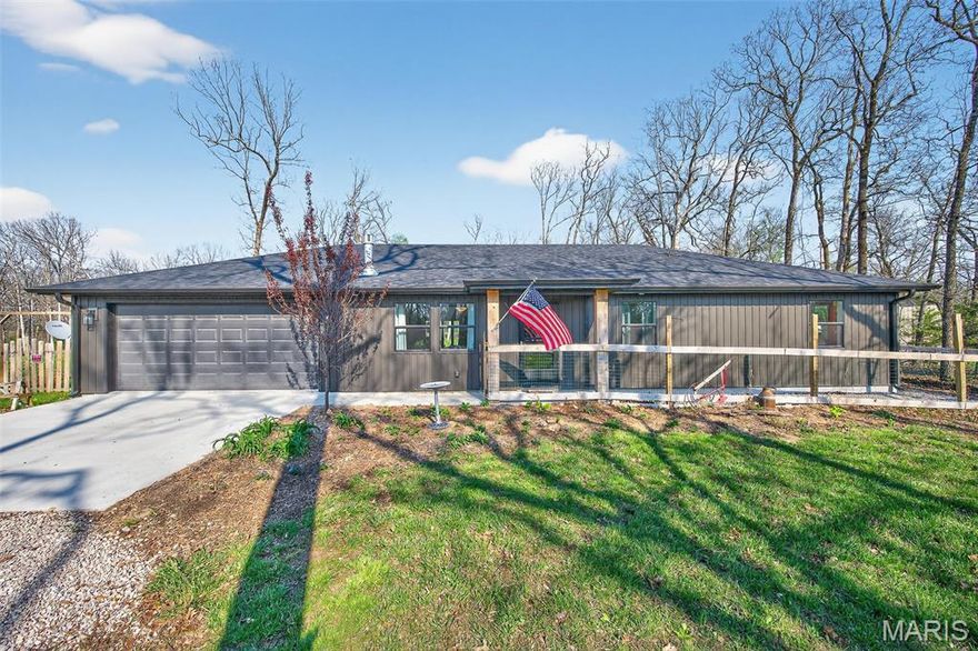 Discover the perfect blend of modern living and peaceful country charm in the Joel E. Barber School District. Built in 2024, this home offers 3 bedrooms, 2 bathrooms, and a 2-car garage on nearly 1 acre of scenic land.
The open interior features a kitchen with granite countertops and an island with seating, a living room with a cozy gas fireplace, a tiled walk-in shower, and a spacious primary suite designed for comfort and style. Outside, enjoy the back deck and fully fenced backyard—perfect for entertaining, relaxing, or letting kids and pets play safely—while the covered front porch offers a charming spot to greet guests.
A well-appointed home in a serene setting, ready to welcome you.