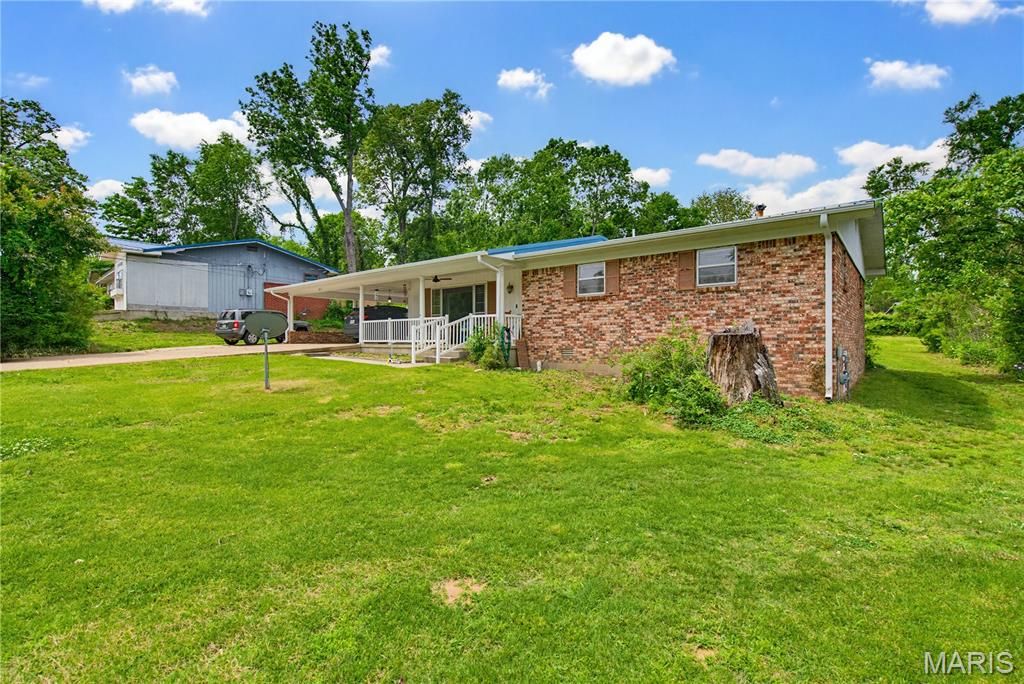 Photo of 2613 N 14th Street, Poplar Bluff, MO 63901 (MLS # 26027291)