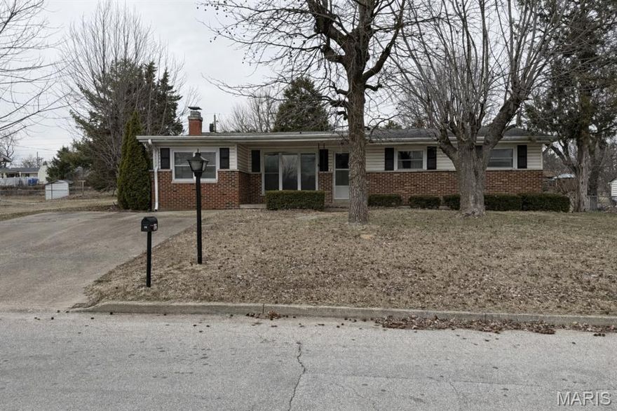 Unlock the potential in this 3 bedroom, 2 full bath home situated on a spacious lot with a large yard offering room to expand, entertain, or simply enjoy the outdoors. Inside, you’ll find a generous eat-in kitchen with plenty of space for gatherings, a cozy fireplace that adds warmth and character to the living area, and a screened-in porch perfect for relaxing evenings overlooking the backyard. The vinyl siding and partial brick exterior provide classic curb appeal and low-maintenance durability. With solid space, a functional layout, and great bones, this home is ready for your vision and updates. Whether you’re an investor searching for your next value-add project or a buyer looking to customize and build equity, this property offers incredible opportunity. Bring your ideas and transform this diamond in the rough into something truly special!