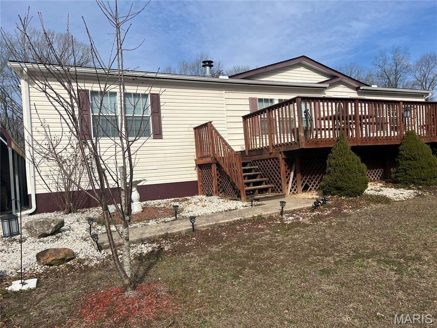 A lot of updates on 5.41 acres in Jackson R2 School district.  3 bedrooms, 2 baths, modular.  Deck on front and back of home, it is all fenced with a 3 stalls horse pole barn and 2 small storage buildings.  Privately owned at the end of the road.  Private well owned.