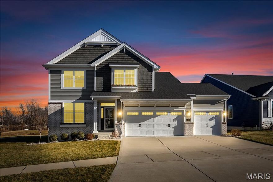 OneHome is showing this property has an open house on 3/1. There is NO open house on this date. 
Located in desirable Dardenne Prairie and just a short golf cart ride along the path to Lake Forest Country Club, this 4-year-old, move-in-ready home offers the updates buyers want—without the years of added expense or hassle. Featuring 4 bedrooms, 2.5 baths, and a spacious 3-car garage, this home combines style, comfort, and thoughtful upgrades throughout. Enjoy excellent curb appeal and a beautifully finished exterior with buried downspouts, irrigation system with rain gauge, and professional landscaping. The garage is a standout with epoxy flooring and custom storage, already done for you. Out back, relax or entertain on the stamped concrete patio with peaceful lake views. Inside, a welcoming entry leads to a private office with glass French doors and a convenient half bath. The open-concept main living area features vaulted ceilings, a stone-surround gas fireplace, and abundant natural light. The dine-in kitchen impresses with granite countertops, stainless steel appliances, custom cabinetry, stainless steel appliances, a large center island, and a butler’s pantry—perfect for entertaining—plus walkout access to the patio. The main-level primary suite offers a walk-in closet and spa-like bath with dual vanities and an oversized glass shower. Upstairs includes a large loft, three generously sized bedrooms with walk-in closets, and a full bath with dual vanities. Additional upgrades include designer window treatments, whole-house water filtration, and more—far too many to list.  Schedule your showing today to see everything this home has to offer—homes like this don’t last long!