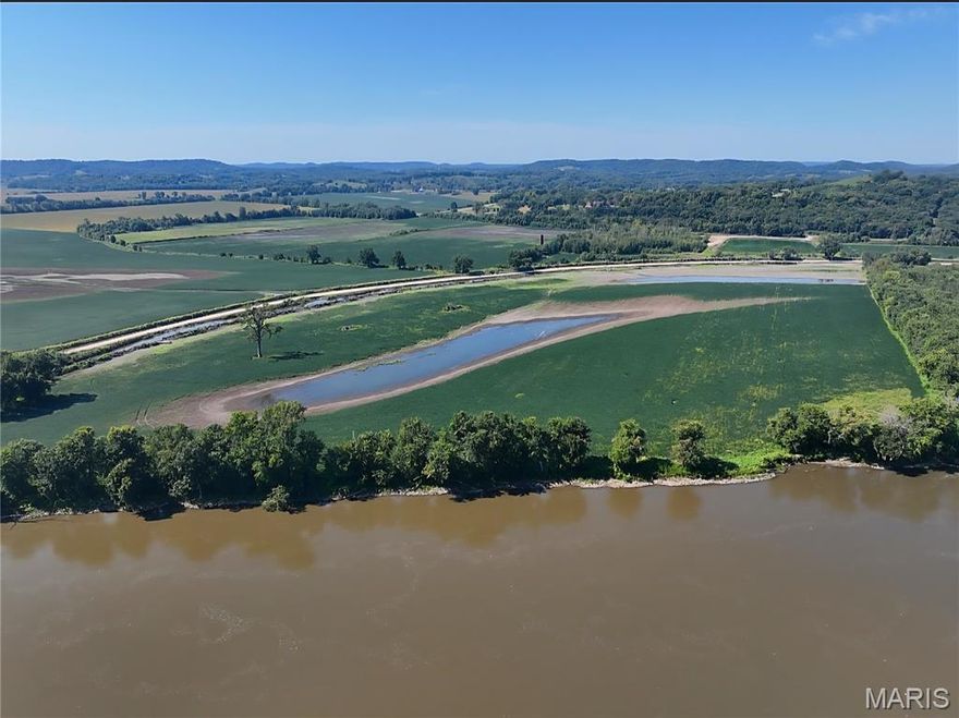 Price Reduction $7500.00. 195 ac Row Crop Farm directly across from Golf Course in Clarksville MO. Approx 17 ac. within levee suitable for Duck club. Alluvia Well on property. Approx 1300 ft of Mississippi river frontage. Soil loaded with nutrients. County rd owned by seller. Most of the timber was cleared last year. 2 Tax Id#s 11-05-22-000-000-005.000 & 11-05-22-000-000-003.000. 
Seller to include 2 diesel pumps & hoses, and 1 week of high lift clean up at buyers discretion.