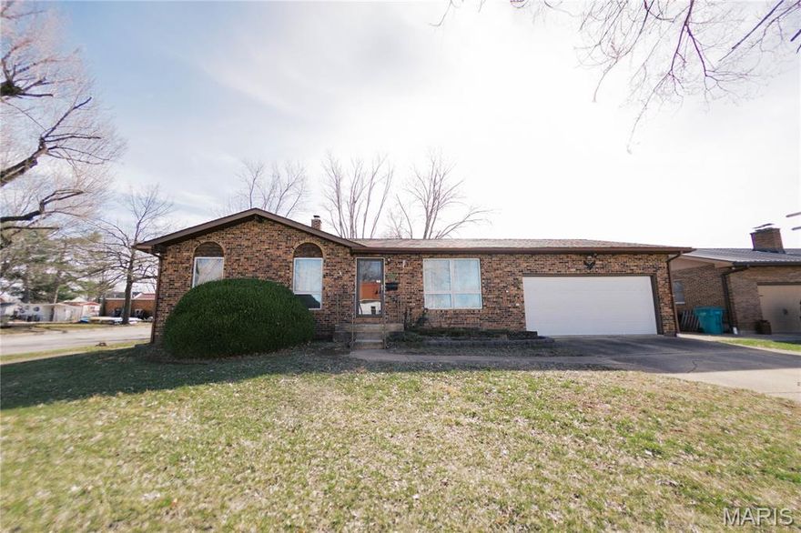 Spacious brick home located on a tree shaded corner lot.  3 BR/ 2.5 BA, kitchen/dining combination.  Full walk up basement, partially finished basement with full bath/shower.  2 car attached garage, 2 outbuildings.