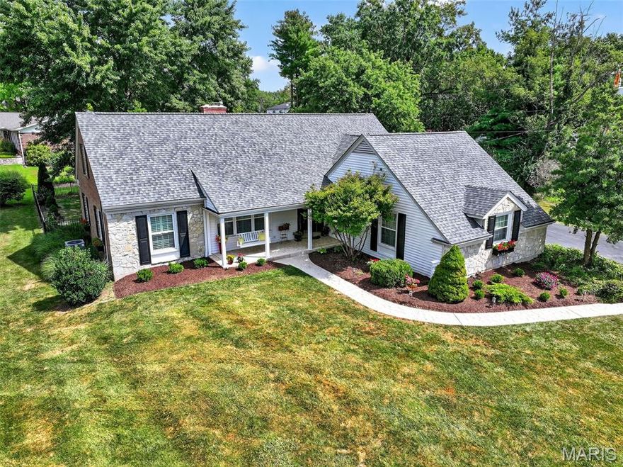 Welcome to this beautifully appointed 1.5-story predominantly brick/stone residence nestled on a meticulously maintained lot in one of Des Peres' most prestigious neighborhoods. Boasting 5 spacious bedrooms and 3 full baths, this home offers the perfect blend of timeless elegance and modern comfort.  Step inside to find rich hardwood flooring complemented by fresh paint throughout, creating a bright and inviting atmosphere. The textured carpeting in the bedrooms adds a warm, luxurious touch, while large windows flood the space with natural light. The open and functional layout provides ideal spaces for both everyday living and entertaining. Living Room, Formal Dining Room, Family Room and Sunporch offer an array of living options. 2-main floor bedrms (one used as an office) & 3 large bedrms on 2nd floor offer plenty of space. Chef's kitchen with breakfast area, 42" cabinetry, granite counters, gas cooktop, double oven stove, frig, microwave & dishwasher plus large main floor laundry with stackable washer/dryer is ideal for most homeowners.  Several access points in/out from main level to gorgeous, private, large lot loaded with trees. A side-entry garage enhances curb appeal and convenience, and the manicured grounds offer the perfect setting for outdoor enjoyment. Unfinished LL offers plenty of storage space. Don’t miss this rare opportunity to own a move-in-ready gem in one of the most sought-after communities in Des Peres—where prestige, location, and style come together.