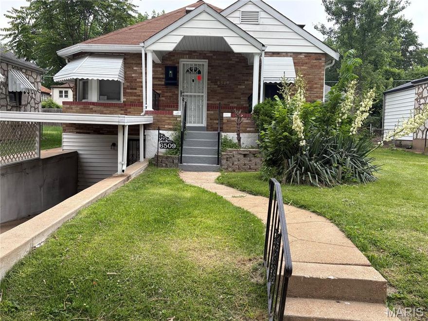 This move-in-ready 3-bedroom home is perfect for first-time buyers or investors seeking a turnkey opportunity. All three bedrooms are conveniently located on the main level, along with a spacious living and dining room combination. The finished basement offers a large additional living area, providing plenty of extra space for entertaining, relaxing, or a home office. A carport and partial walkout basement allow for easy access to the home.
The updated kitchen features stylish white cabinetry, granite countertops, a stainless steel gas range, a stainless steel refrigerator with ice maker, and a brand-new stainless steel dishwasher.