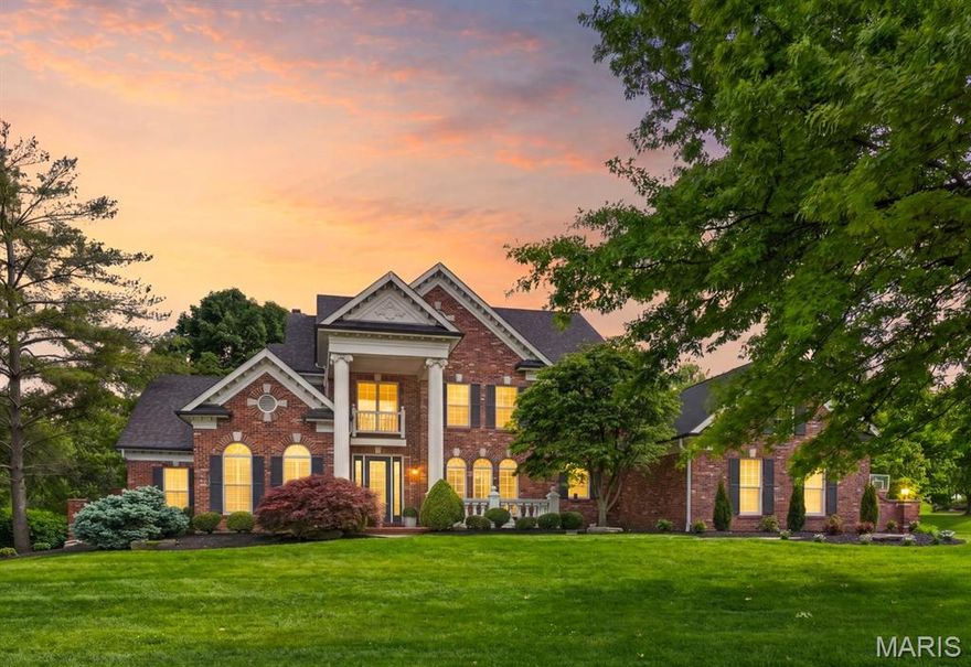 Nestled in one of Chesterfield’s most sought-after neighborhoods and the model display home for Greystone, this stunning 1.5-story residence effortlessly blends timeless elegance with modern luxury. A soaring two-story foyer welcomes you with newly installed American Walnut hardwood floors and leads to a private study featuring custom built-in bookshelves. Extensive millwork, refined architectural details, and exceptional craftsmanship define the home throughout. Freshly updated, the open-concept floor plan is enhanced by all-new designer lighting, creating a bright and inviting atmosphere ideal for both entertaining and everyday living. The gourmet kitchen is a chef’s dream, showcasing Taj Mahal quartzite countertops, premium Wolf stainless steel appliances, a Sub-Zero refrigerator, and seamless flow into the sun-filled breakfast and hearth rooms overlooking the backyard retreat. The main-floor primary suite is a luxurious sanctuary complete with dual custom walk-in closets, intricate tray ceilings, a statement chandelier, and a newly renovated spa-inspired bath featuring heated floors, Cambria Luxe quartz finishes, and a solid surface soaking tub. The two main floor powder rooms have also been renovated, along with laundry room.  Walk up the new staircase, with elegant wrought iron balusters, to refinished hardwood floors, a balcony overlooking the dramatic family room, with its striking fireplace, wall of windows, and a wet bar designed for effortless entertaining. Three spacious bedrooms with custom closets and two full baths complete the upper level.  The expansive finished lower level offers endless versatility, featuring an additional wet bar, game room, family room, gym, private guest suite and bonus room.
Step outside to your own private resort. The impressive backyard features a high-end Pebble finish gunite pool with built-in seating and fountains, a hot tub, charming gazebo, multiple patios, outdoor kitchen islands, and ample green space for kids and pets alike. Even the oversized 3-car garage is exceptional — fully refinished with recessed lighting, full-broadcast epoxy flooring, sleek baseboards, New Age cabinetry, a deep stainless utility sink, and a mounted 75” TV, creating the ultimate showroom-quality workspace and retreat. Impeccably maintained and extensively renovated-too much to list- this extraordinary home truly has it all. Showings begin Friday, May 15th at 10:00 AM. Open House Sunday, May 17th from 1:00–3:00 PM. This is the one you’ve been waiting for.