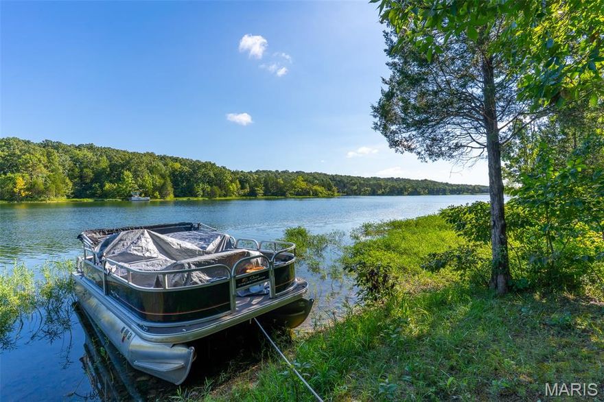 Are you looking to build your WATERFRONT dream home?  This Is It!  This double lot is in it's natural state and has a cleared path to the water with easy access to tie up your boat. Very secluded and nothing across the lake to view but more nature. This is a paradise for nature lovers and fisherman while still being near  town and a straight shot to St. Louis.  (approx 40 miles).  Bonus:  Golf Course within the community is another reason to say YES to this opportunity for lake life.
