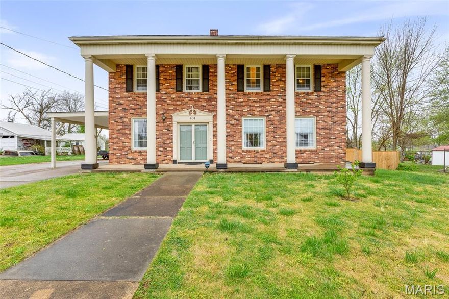 REDUCED!! Welcome to this 4-bedroom, 3.5-bathroom home located in town close to restaurants & shopping. This charming 2-story brick front home boasts a cozy wood-burning fireplace, new roof, 2 bay windows that flood the living spaces with natural light & a full partially newly finished basement with newly finished bathroom perfect for additional living or storage space. The updated kitchen features an island making meal prep a breeze.  Step outside to the new fenced backyard with a patio, perfect for enjoying the warm summer weather. Property also includes a carport & 2-car det garage. The nice level lot offers plenty of room for outdoor activities, and the paved driveway adds convenience. For added peace of mind, the home features a safe room in the basement for emergency situations. The updated kitchen includes newer appliances, & a new dual-unit HVAC system recently installed, ensuring comfort year-round.