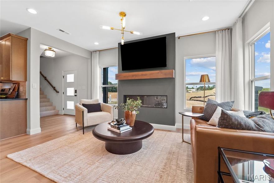 Lombardo Homes’ Luxury Modern Lifestyle Homes at Lienemann Park redefine what luxury means in today’s market—delivering attainable, design-forward homes that make both financial and lifestyle sense. These homes offer modern luxury without compromise, crafted for how people truly live.

Each residence combines exceptional craftsmanship, contemporary design, and low-maintenance convenience to create homes that are as beautiful as they are practical. With open-concept layouts, designer finishes, and efficient construction, these homes offer all the style, comfort, and character of a traditional single-family home in a smarter, more attainable way. Built for today’s homeowner, they are design-forward, maintenance-free, and financially smart—allowing you to enjoy a luxury lifestyle that fits your life.

At Lienemann Park, community and comfort come together. Residents can enjoy a refreshing swim in the resort-style pool, gather with neighbors at the clubhouse, or relax by the fire pits in the courtyard. Families will love the playground and pickle ball courts, while pet owners can take advantage of the dedicated dog park. Green spaces and landscaped courtyards create a sense of tranquility, offering places to unwind, connect, and enjoy the outdoors. Every detail of the community is designed to foster connection and enhance your lifestyle.

Connectivity is at the heart of the Lienemann Park experience. The community offers direct access to the proposed Lienemann Park and its scenic walking trail, making it easy to step outside, stay active, and enjoy nature right from your doorstep. Sidewalks and greenways weave through the neighborhood, encouraging strolls, conversations, and a strong sense of belonging.

More than a collection of homes, Lienemann Park is a destination for those seeking a new way of living—where modern design meets everyday convenience and community connection. Whether you’re relaxing by the pool, entertaining friends, or exploring the surrounding trails, life here is intentionally designed to be effortless, stylish, and fulfilling.

The Luxury Modern Lifestyle Homes at Lienemann Park reflect Lombardo Homes’ long-standing commitment to craftsmanship, innovation, and livability. They are thoughtfully planned to meet the needs of today’s homeowners—delivering modern design, timeless quality, and financial sensibility in perfect balance.

At Lienemann Park, luxury isn’t just about high-end finishes—it’s about living beautifully every day. Experience a community that redefines attainable luxury with homes designed for the way people actually live. Discover the comfort, connection, and confidence of owning a Lombardo Home—where luxury and lifestyle meet in perfect harmony.

 The Arlington End Unit with side entry is a 3 BD, 2.5 BA, 2 car rear entry garage 1869 sq. ft. of living space. 56" Linear Electric Fireplace ,luxury bath option,luxury kitchen option, quartz countertops, stainless steel appliances, rail and spindles, upgraded flooring and lighting, zoned HVAC damper system & much more. UNDER CONSTRUCTION! READY FOR MOVE IN SUMMER 2026