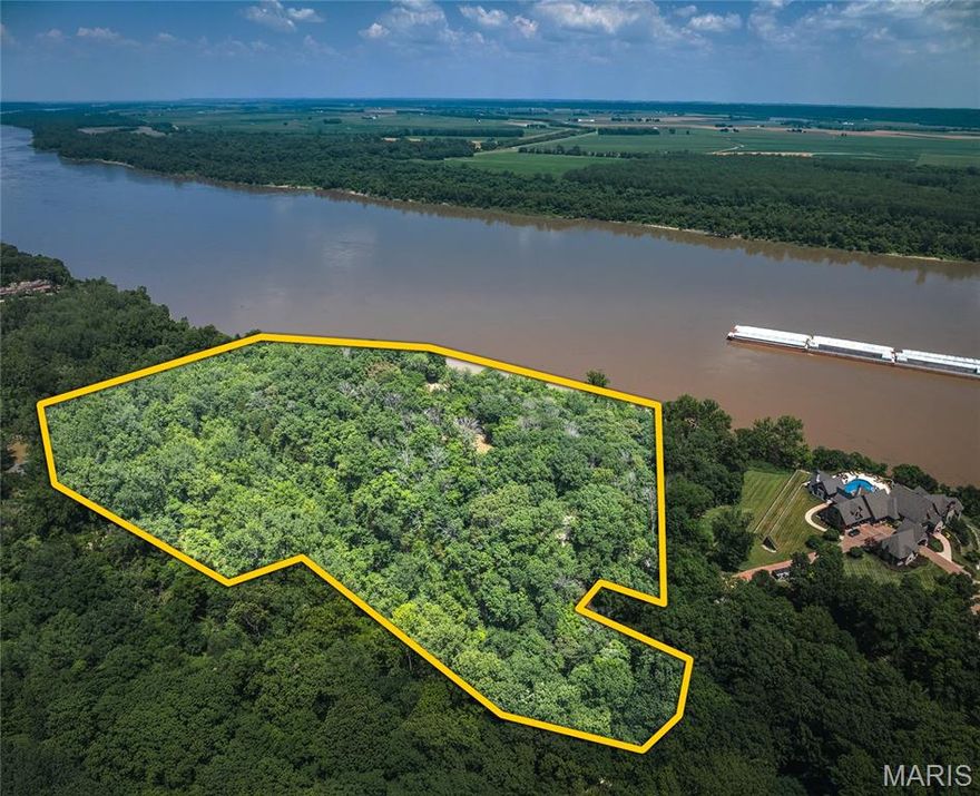 Perched high on a bluff overlooking the Mississippi River, this property offers a remarkable setting to build your dream home with elevated views that stretch for miles. The heavily wooded tract provides privacy and a natural backdrop for a custom build, while the gated subdivision and neighboring homes add to the peaceful, desirable setting. Sitting at the end of a private road, the lot features buried electric on site, with buyers responsible for their own well and septic, and is located within the Dunklin R-5 School District. A unique feature of this property is the easy access to an underground mine on the backside of the parcel, adding character you won’t find anywhere else. Conveniently located between Festus and Arnold, this rare opportunity combines seclusion, scenery, and unmatched river views—perfect for a one-of-a-kind residence or retreat.