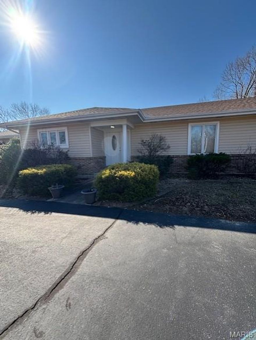 This home is under contract! Tucked away on nearly 5 peaceful acres backing to mature woods, this ranch property offers privacy, space, and outstanding potential. The main residence includes 3 bedrooms, 2 full bathrooms, wood-style flooring throughout most of the home, separate dining room, kitchen with stainless steel appliances and living room with w/b fireplace and door to composite deck. A partially finished basement with walk-out/up access provides two additional rooms with approximately 400 finished sqft and tons of unfinished space/storage. 

An attached three-car garage leads to a secondary residence featuring its own kitchen, bedroom, full bathroom, wood-style flooring and walk-out access to a composite deck—perfect for guests, extended family, or future income potential. 

The property also includes a spacious 30x24 storage shed and ample room to make the land your own. This is an estate property that will need to be cleaned out and refreshed, making it an excellent opportunity for investors or buyers looking to add value. 

Contact Katie for details at 314-766-9876