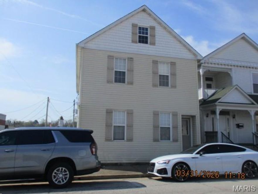 Offset Your Business Expenses Here! Two story building includes an office with bath & kitchen facilities on the main floor-perfect for your small business & a 2-bedroom apartment upstairs that needs remodeling that you can rent or live in.  Located in the downtown business district, 1/2 block from the historic Franklin County Courthouse, 1/2 block from new City Hall, 1/2 block to the incredible Hansen Park. Owner attorney retiring gives this rare opportunity to own this piece of real estate