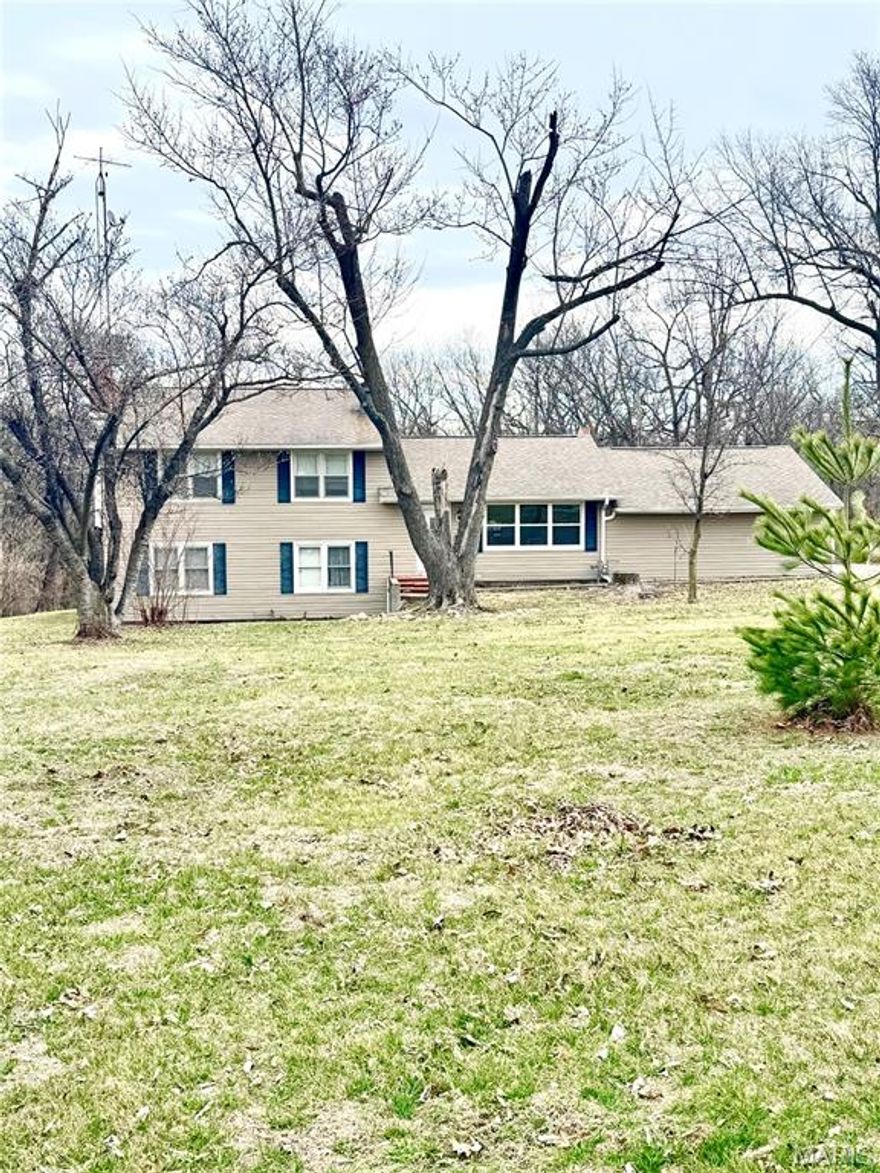 Spacious 3-bedroom, 1.5 bath home situated on over an acre of land, offering plenty of room both inside and out! This property features a bright open floor plan with a huge living room and an additional family room—perfect for entertaining or relaxing with family. Durable ceramic tile in the kitchen of the home for easy maintenance and a clean, modern feel. The home has a living room and a huge family room with a walkout to the back yard. Lot's of natural light throughout this home. 

The kitchen comes fully equipped with all appliances included, making this home move-in ready. A large laundry room provides extra storage and functionality. Outside, you’ll find an expansive backyard with endless possibilities—ideal for outdoor living, gardening, or creating your own private retreat. The home also includes a 2-car garage for convenience and additional storage.

Enjoy the space and flexibility of country-style living while still having the comforts of a well-designed home!