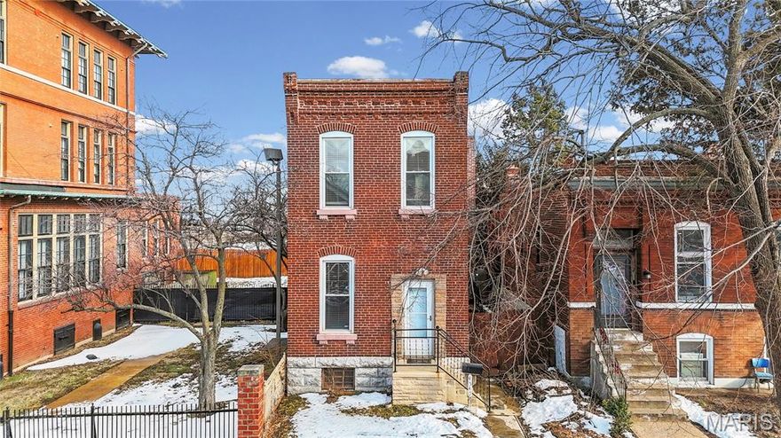 This charming 1905 home blends historic character with major updates and true move-in readiness. Purchased in 2006, the current owner has since renovated major systems for peace of mind, including updated electrical and plumbing/sewer lines, roof, tuckpointing, windows, doors, alarm system, AC and furnace, bathrooms, lighting, and rebuilt front and back steps. Offering 2+ bedrooms and 2 full baths, this home is spacious and provides flexibility for families, guests, or a home office setup. The fenced, private backyard creates a perfect space for relaxing, entertaining, or pets. Located in a convenient city setting close to shops, dining, and public transportation, this property delivers both comfort and accessibility. Ideal as a family home or investment property, it can be converted back to a two-family unit with minimal effort if desired. Offered at a great price and being sold as-is, this is a fantastic opportunity for homeowners and investors alike.