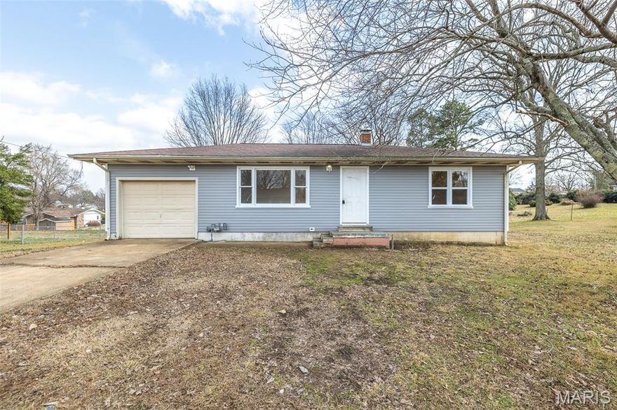 Newly remodeled home setting on a dead-end street in Poplar Bluff. Home offers a large lot with a one-car garage. Large primary bedroom, new cabinets and some newer windows. Walk-out basement and large storage area in basement.