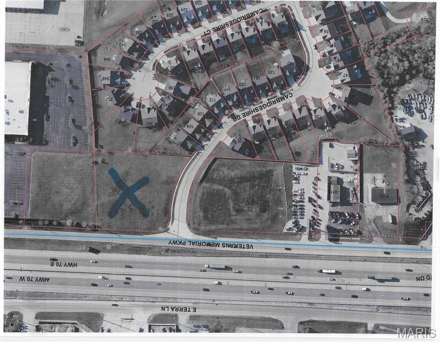 Duplicate listing 24076501. Positioned along the highly visible and rapidly growing corridor of Veterans Memorial Parkway in St. Peters, this 1.47-acre parcel presents a compelling opportunity for investors, builders, and developers seeking both immediate commercial use and strong future upside through potential residential rezoning. Currently zoned commercial, the property benefits from excellent frontage, accessibility, and proximity to established neighborhoods, retail centers, and major thoroughfares—making it an ideal candidate for a thoughtful transition to residential use.

With rezoning, this site opens the door to a wide range of residential possibilities. The acreage is well-suited for luxury townhomes, duplexes, cottage-style homes, or a small single-family enclave, capitalizing on the continued demand for new housing in the St. Peters market. Its size allows for creative site planning, including private drives, green space, and modern amenities that today’s buyers are looking for. Developers could also explore a mixed-density concept, blending attached and detached product to maximize both yield and appeal.

The surrounding area supports strong residential demand, with nearby schools, parks, shopping, and dining all within close reach. Easy access to major routes enhances commuter convenience while still offering a neighborhood feel. As the St. Peters area continues to grow, opportunities to reposition commercially zoned land into residential developments of this scale are becoming increasingly limited.

Whether maintained as a commercial investment or transformed into a residential community, 8100 Veterans Memorial Parkway offers flexibility, location, and long-term potential—making it a standout opportunity in one of St. Charles County’s most active development corridors. Soil study available. Empty lot to the left and the right of 8100 Veterans Memorial Parkway, room to grow your idea.