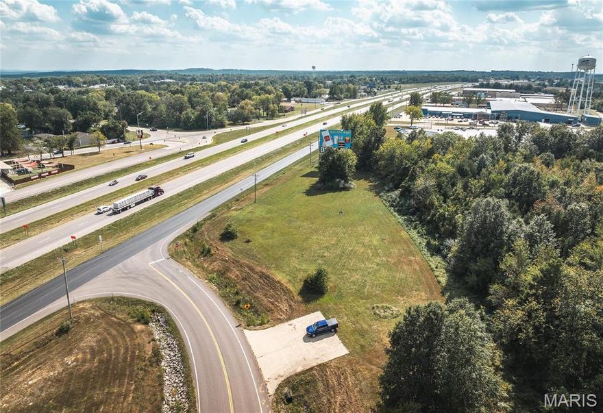 Interstate I-44 Exposure. 1.3 acres m/l of prime commerical property located just off of Sullivan Exit 225 near the Elmont overpass. This property has the benefit of the residential boom in Sullivan these past few years with continued residential building happening at a rapid pace.  The Elmont overpass was developed for the continued growth of Sullivan and the outlying areas to the north. This high traffic corner has an average daily traffic count of 31,000 from I-44 with 461' of road frontage. City utilities available. The traffic count is projected to reach a staggering 80,000+ by 2035. Take advantage of the boom in residential building, easy access, and I-44 access & exposure. Perfect location for a coffee shop, convenience store, gasoline station, retail operation, restaurant or automotive...just to name a few. Ideally located for maximum visibility and high traffic, it comes with the added advantage of an existing billboard lease, ensuring a steady stream of income. Location: City, High Traffic, Hwy/Interstate Frntg