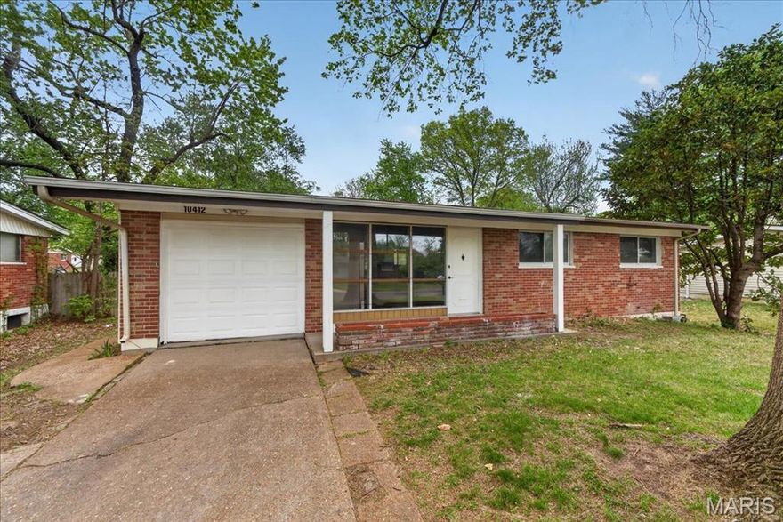 Welcome home to this beautifully refreshed brick ranch with updates already done for you. Step inside to an open Living, Dining, and Kitchen layout filled with natural light from oversized front windows. The updated Kitchen flows seamlessly into the main living space, making everyday living and entertaining easy. Fresh paint and flooring run throughout the main level, along with 3 Bedrooms and 2 renovated Bathrooms. The partially finished Lower Level offers additional living space, a Full Bath, and Laundry—perfect for a Rec Room or Home Office. Enjoy the enclosed Porch for morning coffee or evening relaxation, plus a large fenced Backyard with plenty of room to play or entertain. Complete with a 1-Car Attached Garage and thoughtful updates throughout, this home is move-in ready and designed for comfortable living. Come see your new home today!