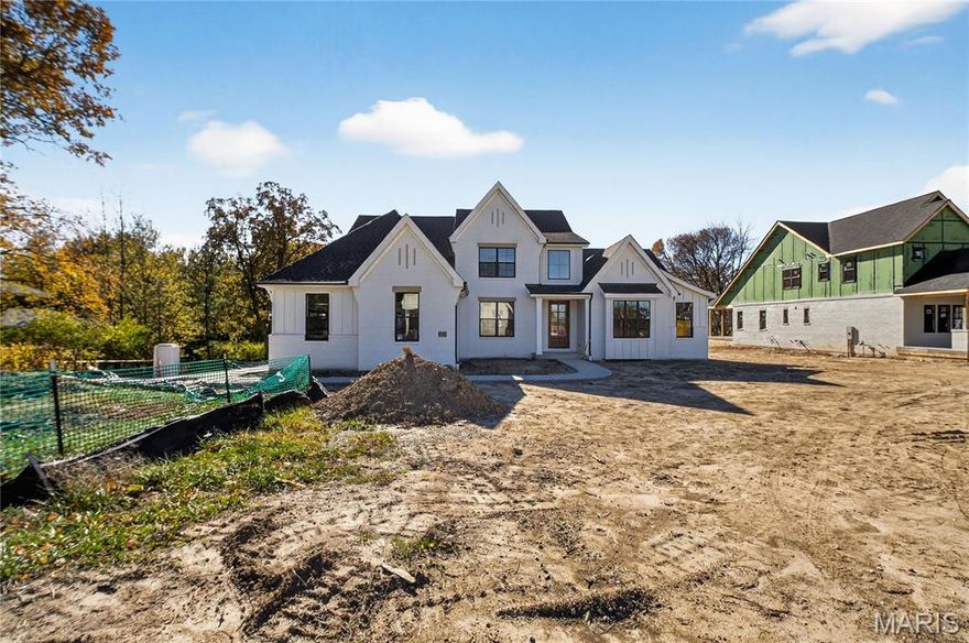 Located in the heart of Olivette and nestled within the award-winning Ladue School District, this exquisite 5-bedroom, 4.5-bathroom home is a rare opportunity to own a luxury retreat on a spacious, level lot—perfectly suited for outdoor living, entertaining, and even your dream pool.

Step inside to discover designer finishes throughout, including sleek quartz countertops, Pella doors and windows, and thoughtful architectural details that elevate every room. The chef’s kitchen flows seamlessly into expansive living and dining areas, with natural light pouring in from every angle.

The oversized master suite is a true sanctuary, featuring a spa-like bathroom, generous walk-in closets, and ample space for a private seating area or home office. Each of the additional bedrooms offers comfort, privacy, and modern conveniences.

Enjoy the changing seasons in your outdoor room—an ideal space for relaxing with friends/family, or simply taking in the beauty of your surroundings. With plenty of room for a pool and situated on a large, level lot, the possibilities for your dream backyard are endless.