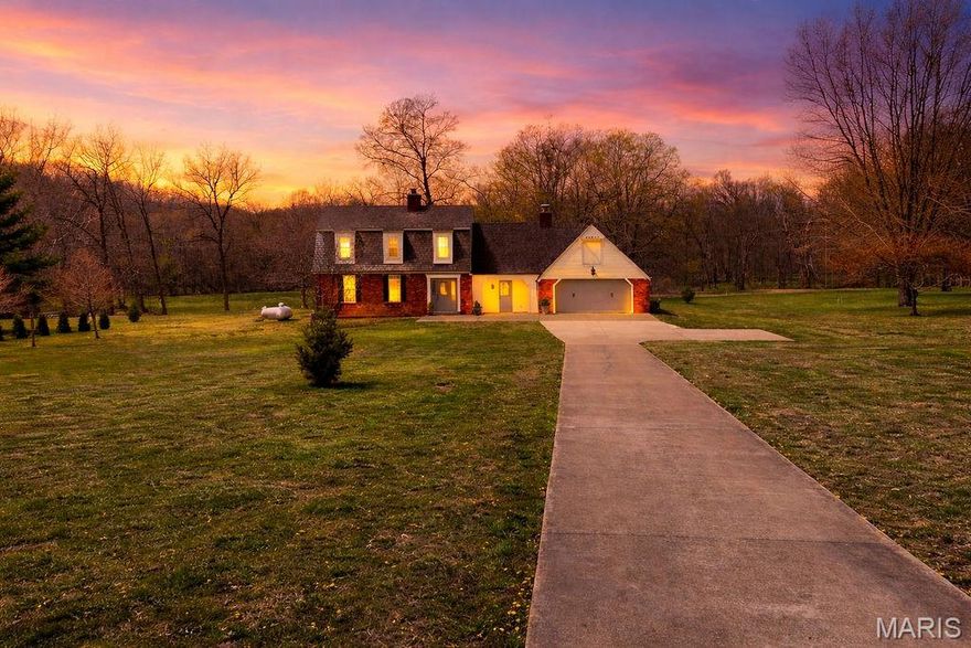 From the moment you pull into the driveway...you will know this is the ONE!! Space, charm, and personality all in one!! Rare opportunity to own a sprawling 5-bedroom, 3.5-bathroom estate offering a massive 2,900 square feet of finished above-grade living space! Perfectly situated on 3.0 beautiful, open acres, this property provides the ultimate "best of both worlds" scenario: true country living and wide-open views. Located just 1.7 miles from the Farmington city limits. Whether you are looking for room to grow, space for outdoor hobbies, or a peaceful retreat close to town amenities, this home delivers. A fresh coat of paint was added to the front doors and trim. Out back, enjoy a large, covered patio made for gatherings, quiet mornings, and everything in between.

The interior has been thoughtfully designed for both comfort and accessibility. The heart of the home features a highly desirable main-floor primary suite, complete with a private full bathroom—ideal for those seeking single-level living options. The convenience continues with a dedicated main-level laundry room, keeping your daily chores separate from the upper-level sleeping quarters. Every inch of the home has been revitalized with a fresh coat of paint, creating a bright, neutral, and inviting atmosphere that is ready for your personal decor. Lots of windows throughout that brings in lots of natural light. There are 2 cozy wood burning fireplaces perfect for relaxing evenings. There is a separate dining room and also a breakfast room. 

With five true bedrooms and three and a half baths, there is no shortage of space for family, guests, or a home office. While the home does not include a garage, the expansive floor plan more than compensates with its generous room sizes and a massive unfinished basement. This lower level is a clean slate, perfect for a workshop, home gym, climate-controlled storage, or future finishing to add even more equity to the property.

You can purchase with absolute confidence knowing the big-ticket items are already addressed. This home features a newer roof (only 7 years old) and a brand-new, state-compliant septic system, saving you from major immediate expenses.  There is a Centurion generator for peace of mind. The 3-acre lot is predominantly open and level, offering endless possibilities for gardening, building a detached shop, or creating an outdoor entertainment oasis. Properties with this much finished square footage, significant acreage, and proximity to town are a rare find. This well-loved family home is ready for its next chapter and new memories. Schedule your private tour today and see the potential for yourself!