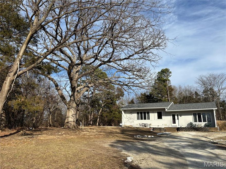 WARM and INVITING:
Darling 2 bed, 1 bath home tucked back off the road for added privacy and peaceful living. This cozy property features a brand new roof, furnace only 3 years old, and a new septic system currently being installed--offering major updates for a worry-free ownership. A bonus room provides flexible space that could easily serve as a 3rd bedroom (non conforming), home office, or hobby room. A perfect blend of charm, updates, and seclusion--don't miss this one.