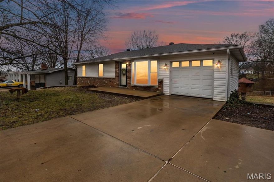 Don’t miss this beautifully updated home on over half an acre! Featuring 3 bedrooms and 1.5 baths on the main level, this home offers the perfect blend of comfort, space, and convenience.

Step inside to a freshly painted interior and a bright eat-in kitchen complete with cathedral-style cabinetry, stainless sink, pantry, and a sleek, smooth-top electric range with self-cleaning oven. Enjoy easy indoor-outdoor living with a walk-out to the large 20x16 deck—perfect for entertaining—plus stairs leading down to an equally spacious 20x16 patio.

The finished walk-out basement provides additional living space ideal for a family room, game room, or home office. The fully fenced yard offers privacy and room to roam, all on a generous half-acre lot.

Retreat to the primary bedroom with its own private half bath featuring an updated vanity, while the hall bath has also been refreshed. A one-car attached garage adds everyday convenience.

Space, updates, and outdoor living—this one has it all! Schedule your showing today!