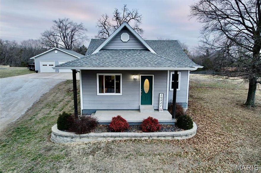 Welcome to peaceful country living just minutes from town! Situated on 1.87 acres, this charming 3-bedroom, 2-bath home offers the perfect balance of comfort, space, and convenience. Originally built in the 1940s and extensively remodeled in 2011, the home features updated plumbing, electrical, HVAC, insulation, flooring, cabinetry, and more — giving you modern reliability with classic character.

One of the standout features of this property is the covered back porch, perfect for relaxing or entertaining while overlooking the large, flat backyard shaded by a beautiful catalpa tree. The outdoor space is ideal for gardening, pets, or simply enjoying the quiet setting. A ready-to-use chicken coop adds to the property’s rural charm and functionality.

The detached two-car garage provides excellent space for parking, storage, or a workshop setup. Inside the home, you’ll find approximately 1,500 square feet of living space, a spacious kitchen, main-floor laundry, and an unfinished basement offering future expansion potential.

Conveniently located about one mile from I-55 and just minutes from Ste. Genevieve, this property offers easy commuting while maintaining a quiet country feel.

Whether you’re looking for a starter home, downsizing opportunity, or a place with room to grow, this property checks all the boxes.