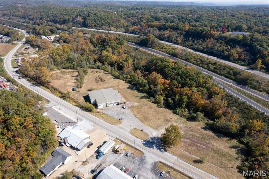 Prime development opportunity! This Property is in a High Traffic Area! 
Approximately 13.5 acres with 1,275 total road frontage!

Great location only minutes from Hwy 270 & Hwy 55. This property has the potential for several different uses including, light industrial, manufacturing, retail, and warehousing just to mention a few. 

The building and office space consist of over 20731 Sq. ft that can be used for multiple purposes.
The building has 5 oversized overhead doors; 4 on the front of the building and 1 door in the rear of the building which makes access very easy for large equipment. All utilities including water, sewer and electric are on site. 

Building and 6 acres is in the floodway, but the building can be "WET PROOFED" per Jefferson County Code.

The seller will divide the acreage up as it fits the needs of the potential buyers. (Minimum of 2 acres.)