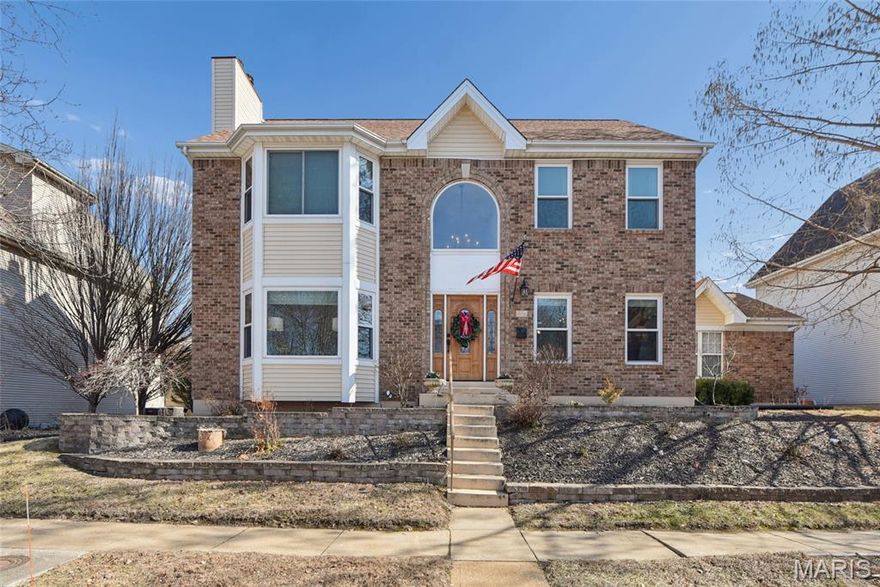 With 4 bedrooms, 3.5 baths, and over 2,800 square feet of total living space, this classic brick residence in sought-after University Place combines architectural presence with a thoughtfully designed interior built for everyday living and entertaining. Tall ceilings and abundant natural light create an airy, welcoming feel throughout, complementing one of the larger floor plans in the neighborhood.
The kitchen is designed for both daily living and hosting, featuring a center island with stainless gas cooktop, double ovens, and a beverage/coffee station. The main gathering space showcases a fireplace and bay window and flows into a private room currently used as a fourth bedroom — offering flexibility for a home office, guests or additional living needs.
Upstairs, the oversized primary suite feels like a true retreat with its vaulted ceiling and private fireplace. The adjoining bath includes dual vanities, a jetted tub, and separate shower. Two additional generously sized bedrooms and second-floor laundry hookups add everyday convenience.
The lower level adds flexibility with a generous partial finish, half bath, second laundry area, and ample storage. Thoughtful updates throughout enhance comfort and long-term value.
Set on a rare, fenced double lot, the property offers privacy and seamless indoor-outdoor living, highlighted by a spacious deck ideal for entertaining. An attached two-car garage and a prime location near Wash U, Forest Park, dining, and shopping — with walkability to both Clayton and the Delmar Loop —further enhance the overall lifestyle experience.